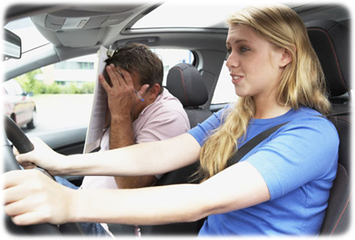 Young Floridian learning how to drive with instructor